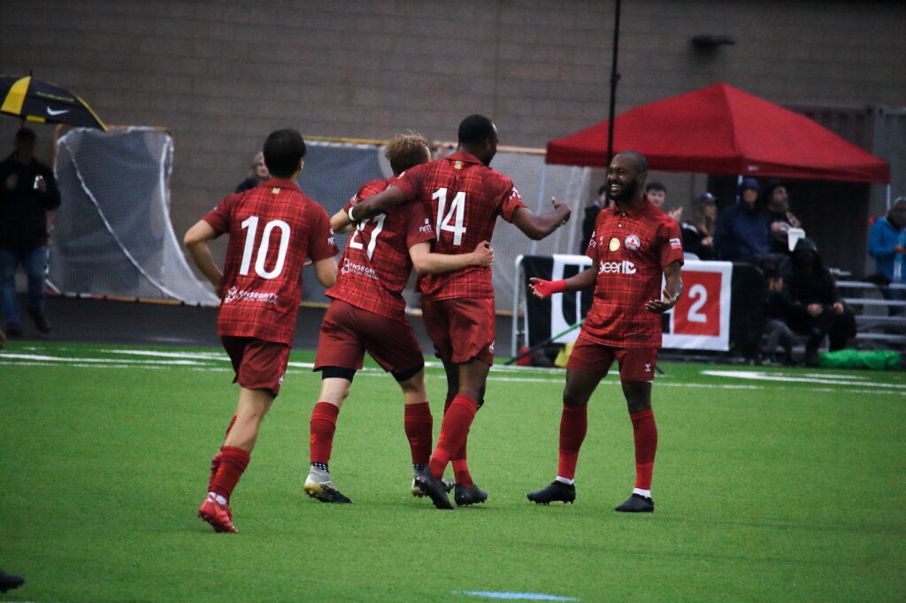 Reds celebrate goal vs Oly Town